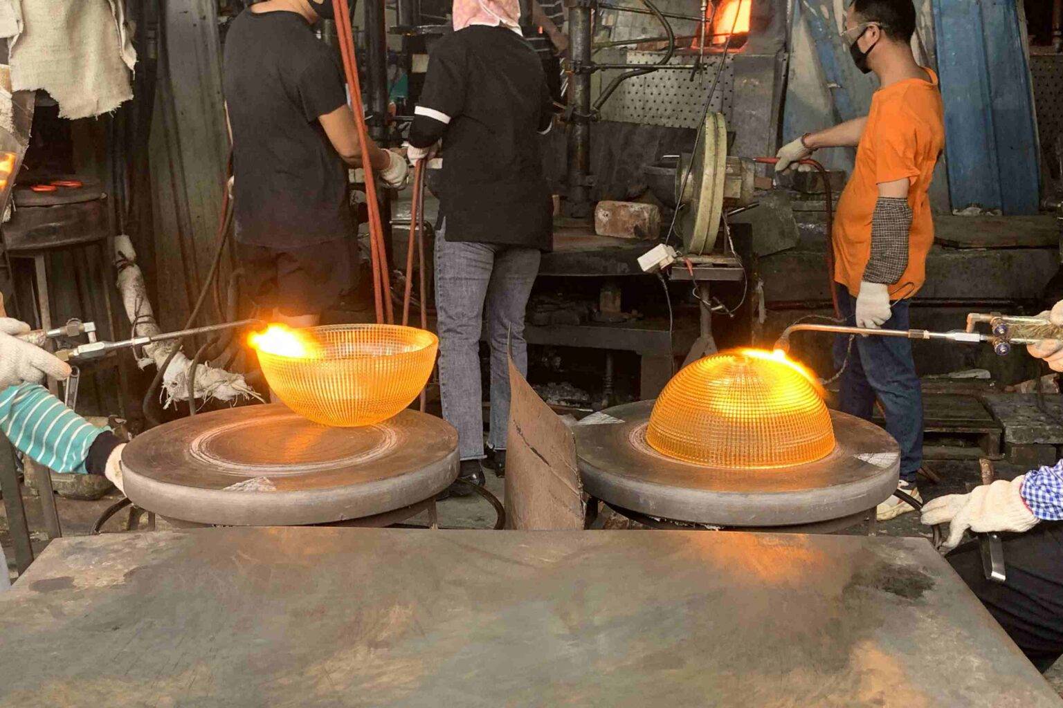 Glass hot rotational forming processing