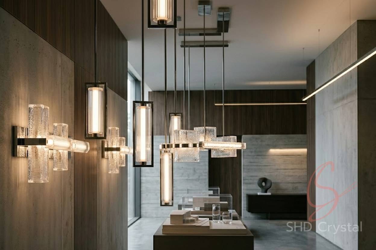 elongated glass lighting forms