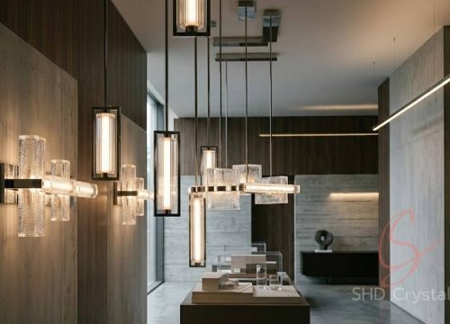 elongated glass lighting forms